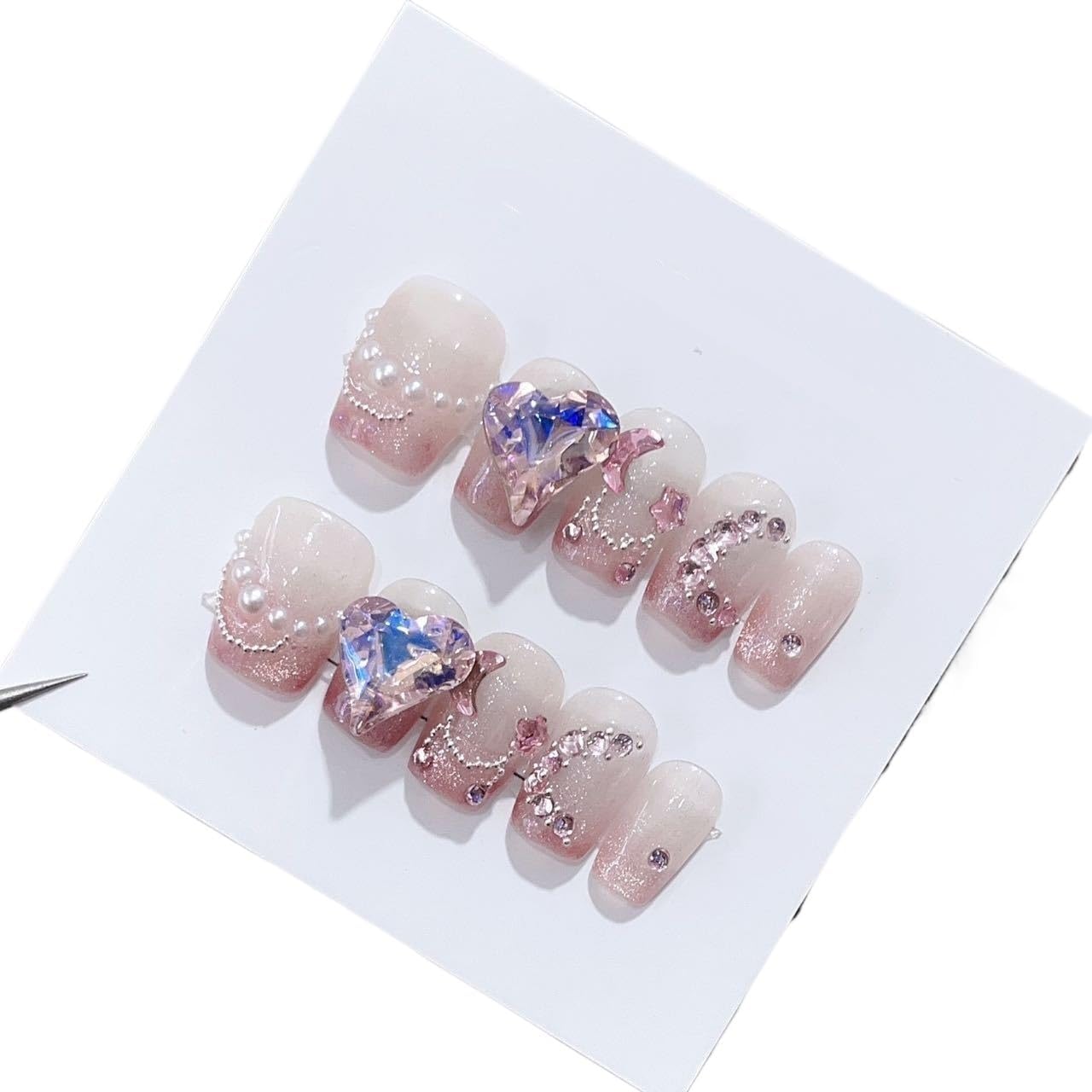 ZIIVIEVS handmade cat eye French short square round press on nails front view showing shimmering pink design