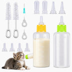 A newborn kitten being safely nurtured using the authentic Tondiamo imported silicone nipple and scale marked bottle.