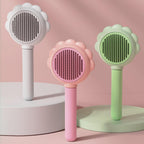 Stainless steel pin grooming comb massaging a cat undercoat gently