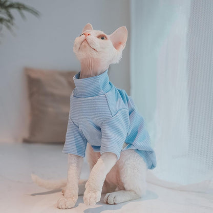 Rear view of cat wearing fitted blue pinstripe thermal apparel