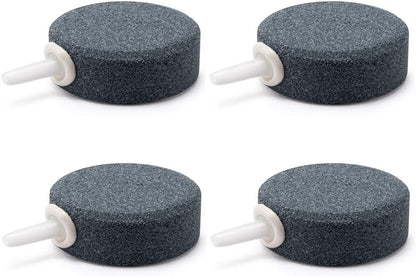 Hydroponic nutrient reservoir setup utilizing round bubble stones for root oxygenation.