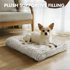 White fluffy kennel pad inside a dog crate