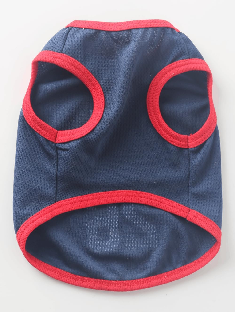 Close up of breathable mesh fabric on navy dog jersey