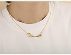 XROLAND sausage dog clavicle chain necklace lifestyle view elegant neck chain
