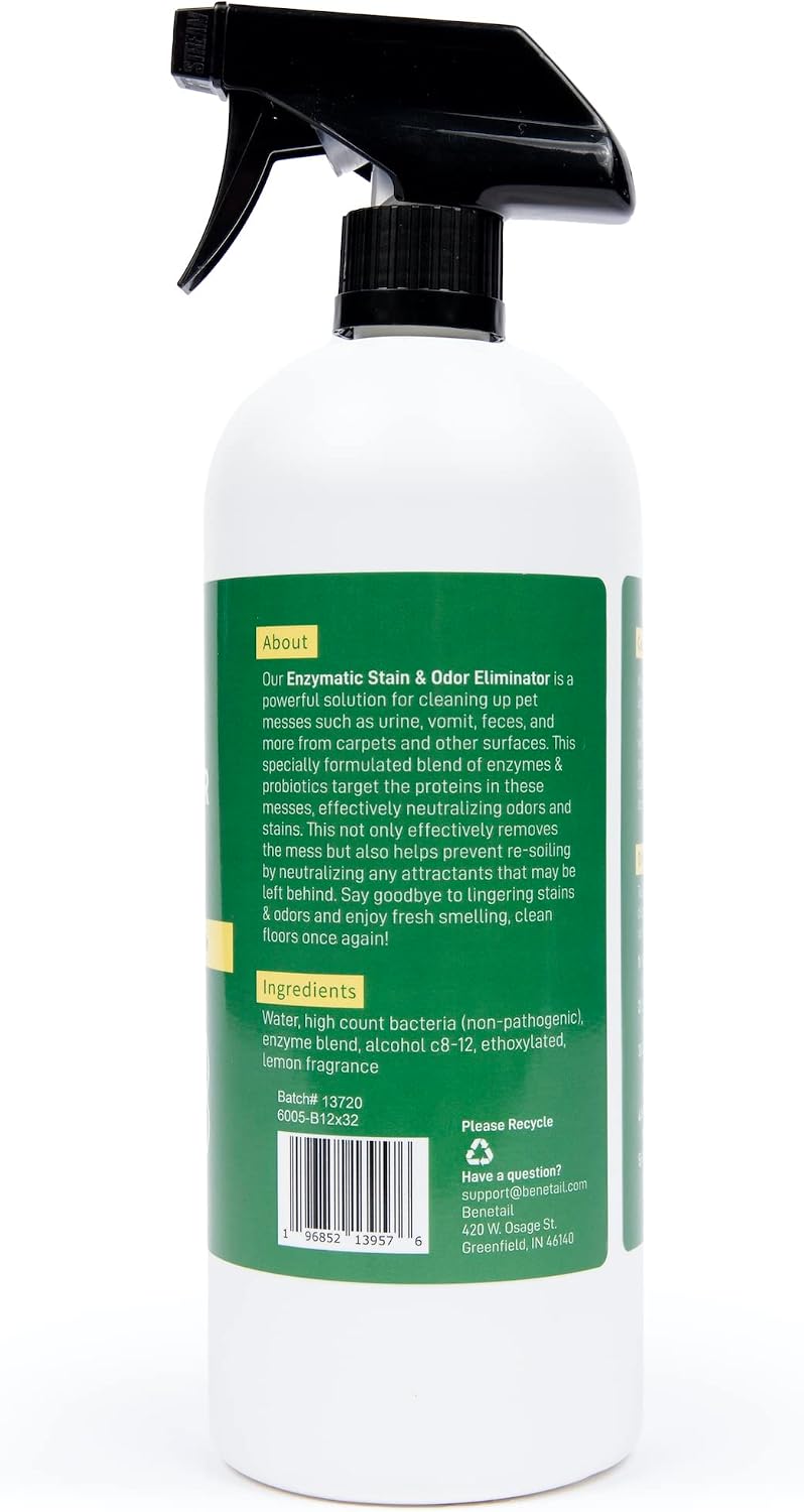Benetail odor eliminator spray being used next to a puppy training crate.