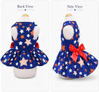 Patriotic puppy outfit highlighting the large red satin bow on the back.