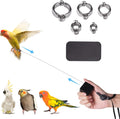 Swirge retractable bird leash and harness kit front view showing white casing and accessories.