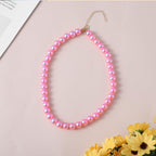 German Shepherd wearing Ymapinc pink chunky pearl statement costume collar