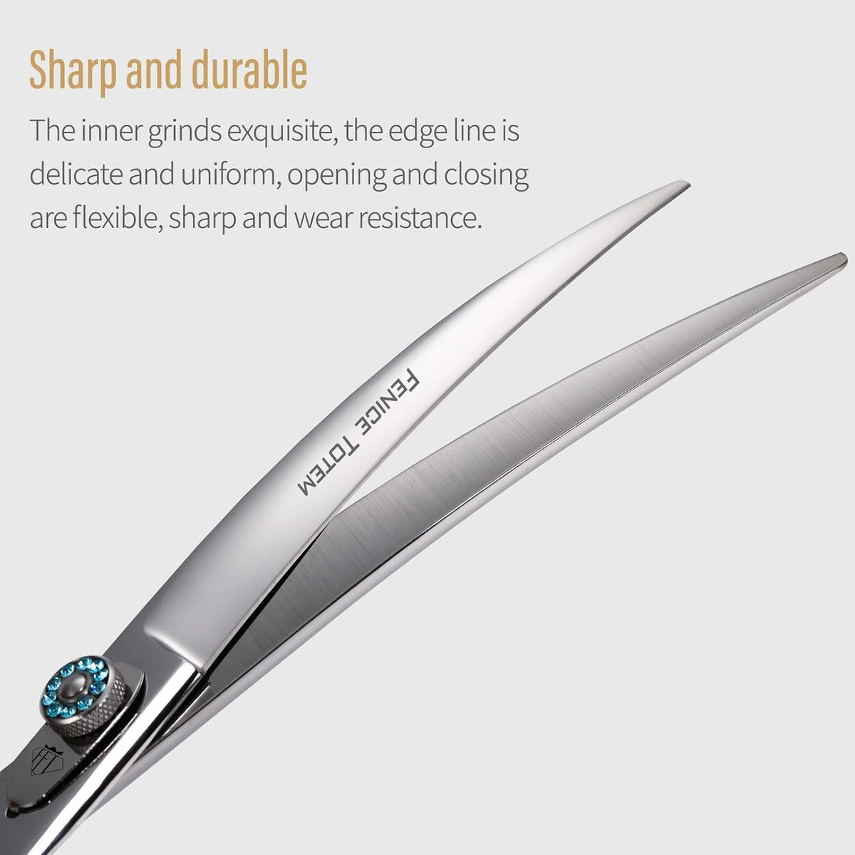 Fenice Totem professional pet shears demonstrating the natural curved arc design for shaping dog fur.