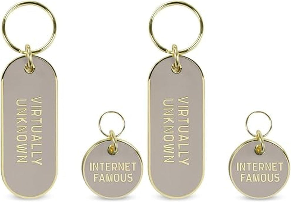 Lifestyle view of the teal Howligans keychain attached to a bag or keyring.