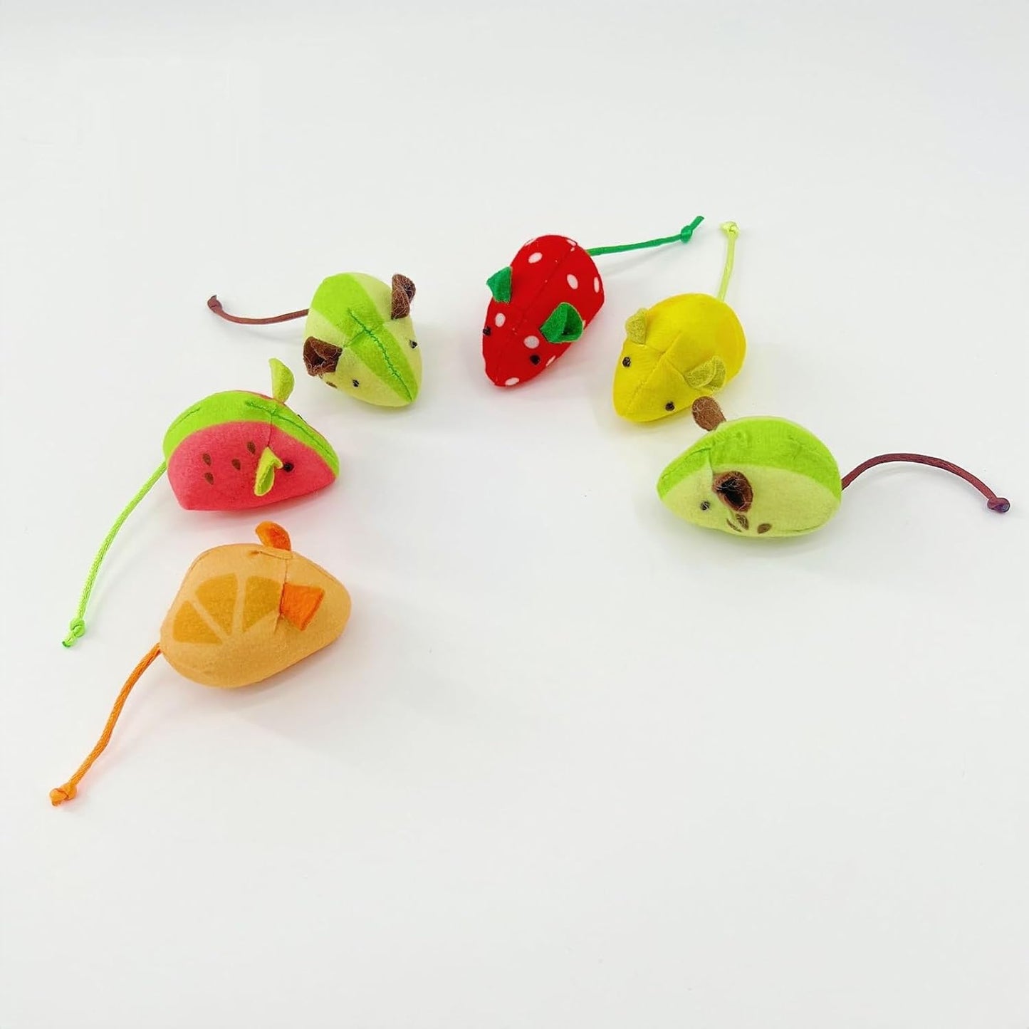 Plush watermelon and strawberry mouse toys close up details