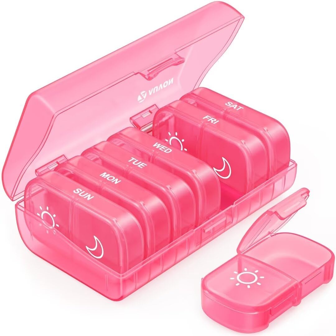 AUVON XL weekly pill organizer front view showcasing pink translucent seven day layout.