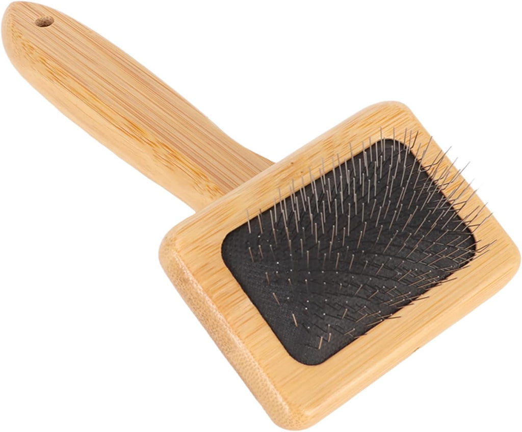 Compact sheepskin rug maintenance brush hanging on a wall storage hook