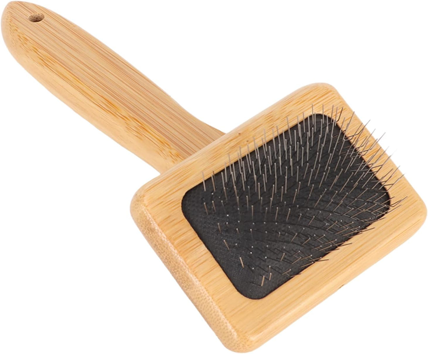 Compact sheepskin rug maintenance brush hanging on a wall storage hook