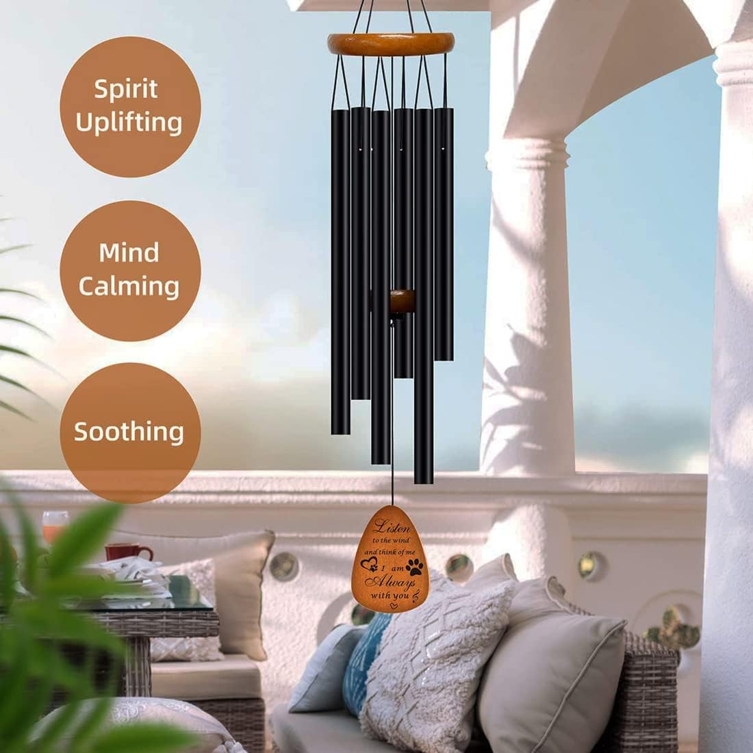 Side view of pet memorial wind chime on a wooden porch