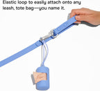 Soft touch lilac plastic dog poop carrier showing the elastic attachment loop.