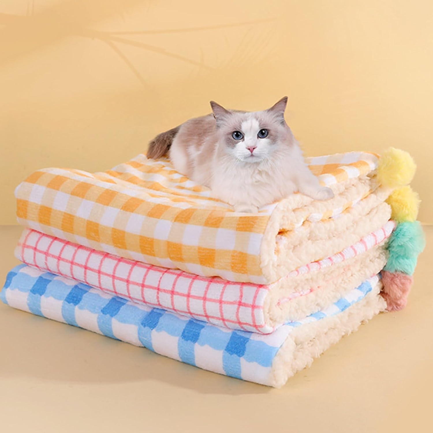 Haourlife machine washable cat pillow and blanket set being cleaned