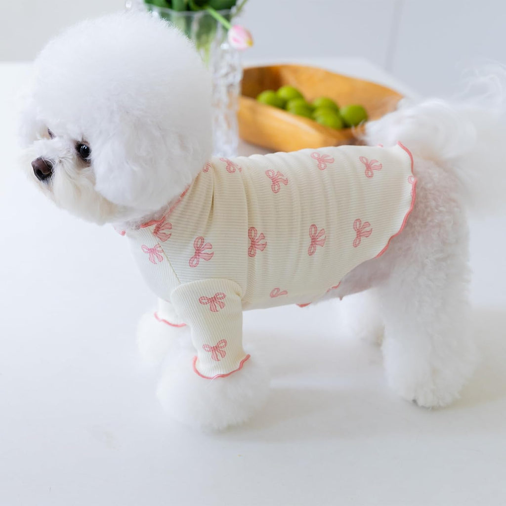 Back view of pink stretchable cat and dog dress with bow design