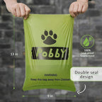 Green biodegradable pet waste bags with black paw prints on rolls.