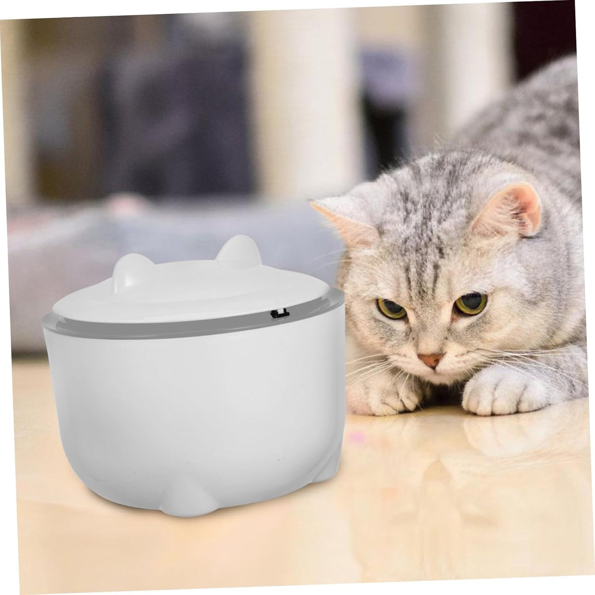 Wooneky cat waste bin placed in a small modern bathroom