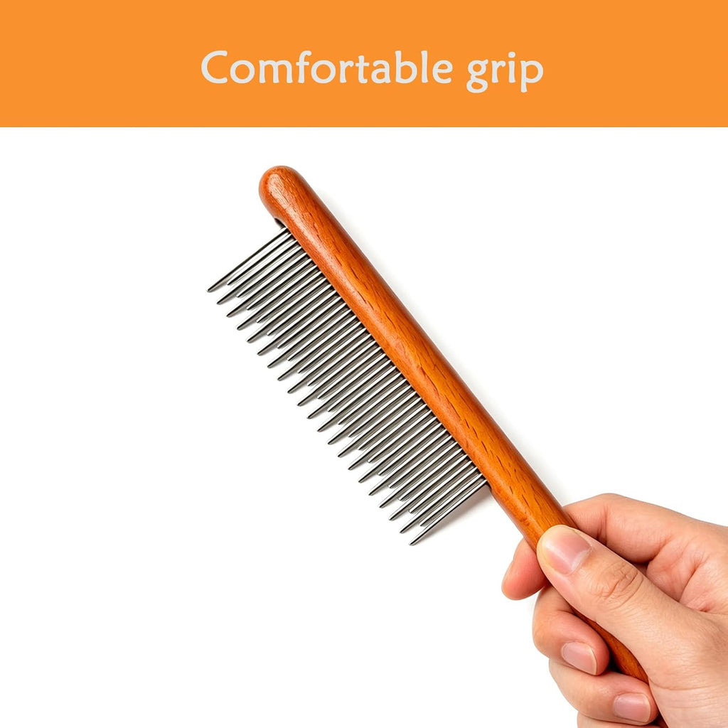 Yddpet grooming comb held in hand showing wooden handle