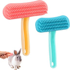 HekouJiub silicone rabbit grooming brush pack of two showing the pink and blue small pet massage combs front view