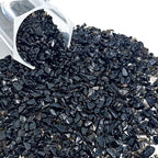 Close up of 5-7mm polished black crystal chips
