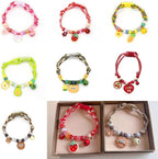Cute pink pet costume jewelry displayed fully extended demonstrating the twenty to thirty centimeter range.