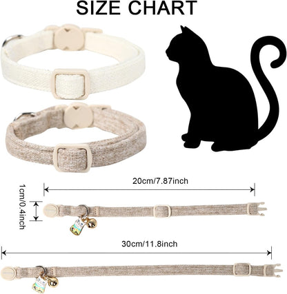 DOGWONG two pack white cotton hemp collars displayed flat showing the removable charm bells.