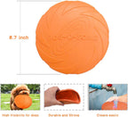 Orange rubber dog frisbee floating on water