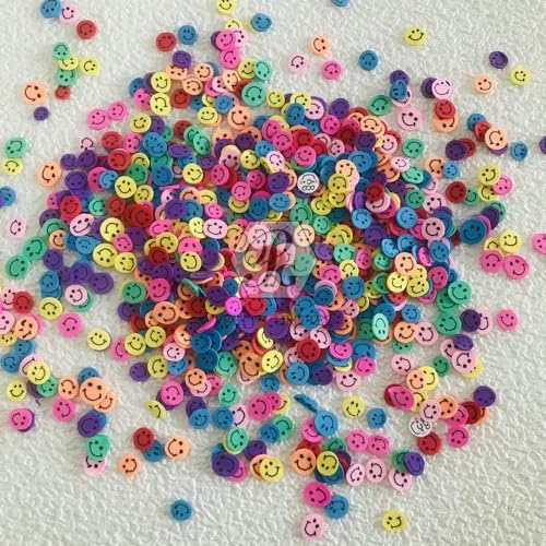 Close up shot of PrettyG fimo slices being applied onto a model nail for detailed 3D nail art decoration.