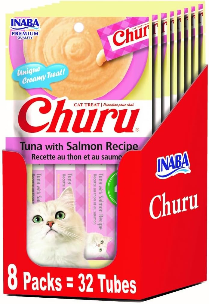 Inaba Churu creamy treat tube being served to a cat