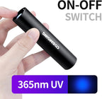 Darkbeam pocket sized black light illuminating fluorescent safety strips on international currency notes.