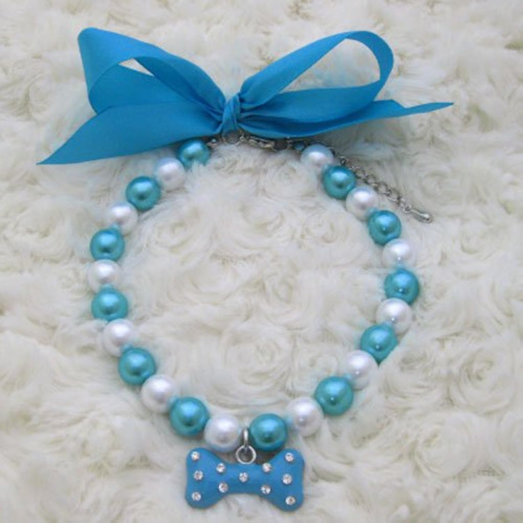PetFavorites authentic imported designer pet jewelry on a white background.