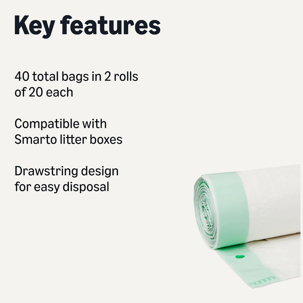 Durable drawstring pet litter liners being lifted from an automatic waste bin drawer