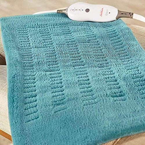 Sunbeam king size electric heat therapy pad laid flat displaying the full twelve by twenty four inch coverage area