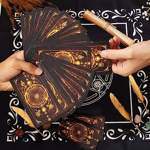 Detailed view of the 78 black tarot cards with gold foil accents