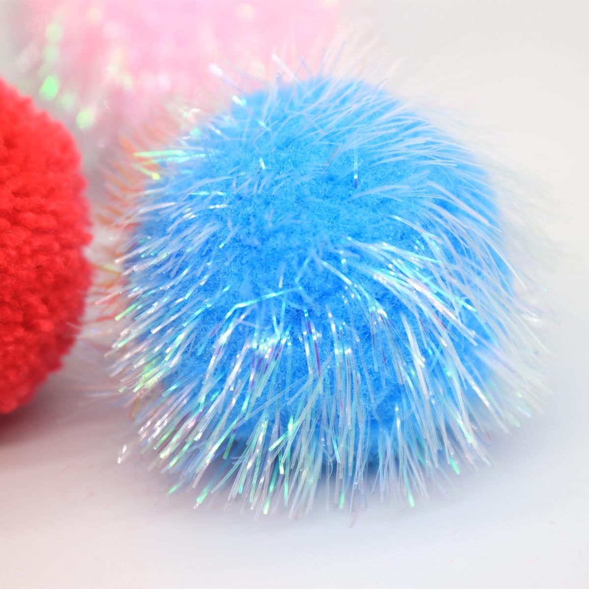 Assorted sparkle and yarn cat balls for kittens