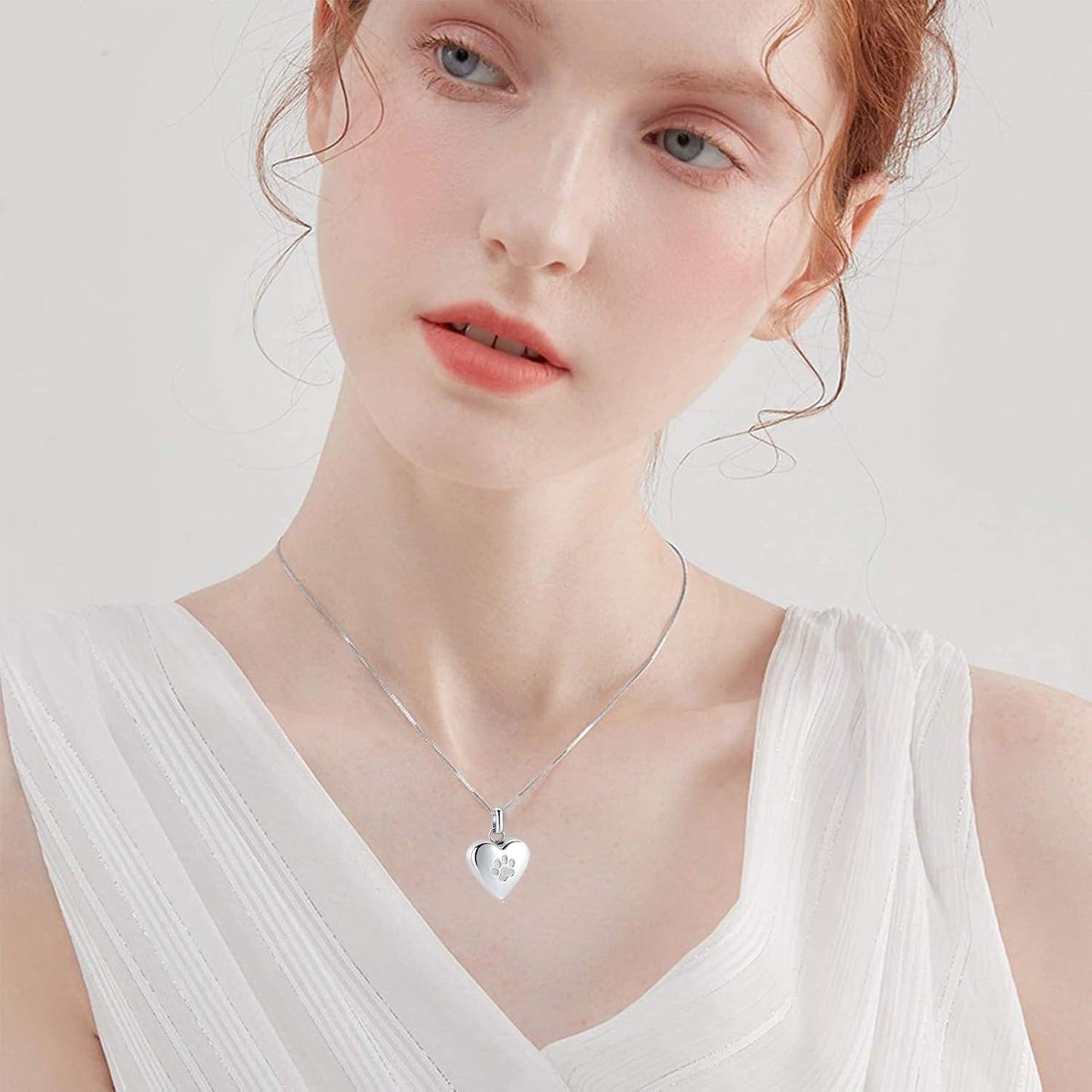 Perspective view of heart memorial keepsake jewelry