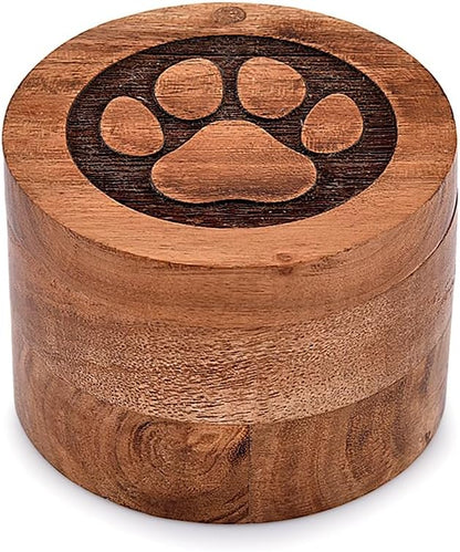 Close up of hand carved paw print on acacia wood pet urn
