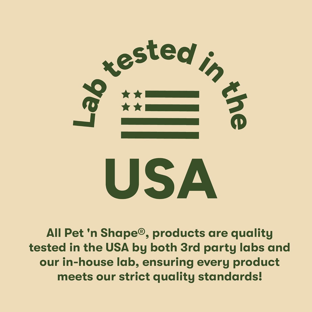 A small dog happily chewing on a Pet 'n Shape chicken wrapped rawhide twist snack