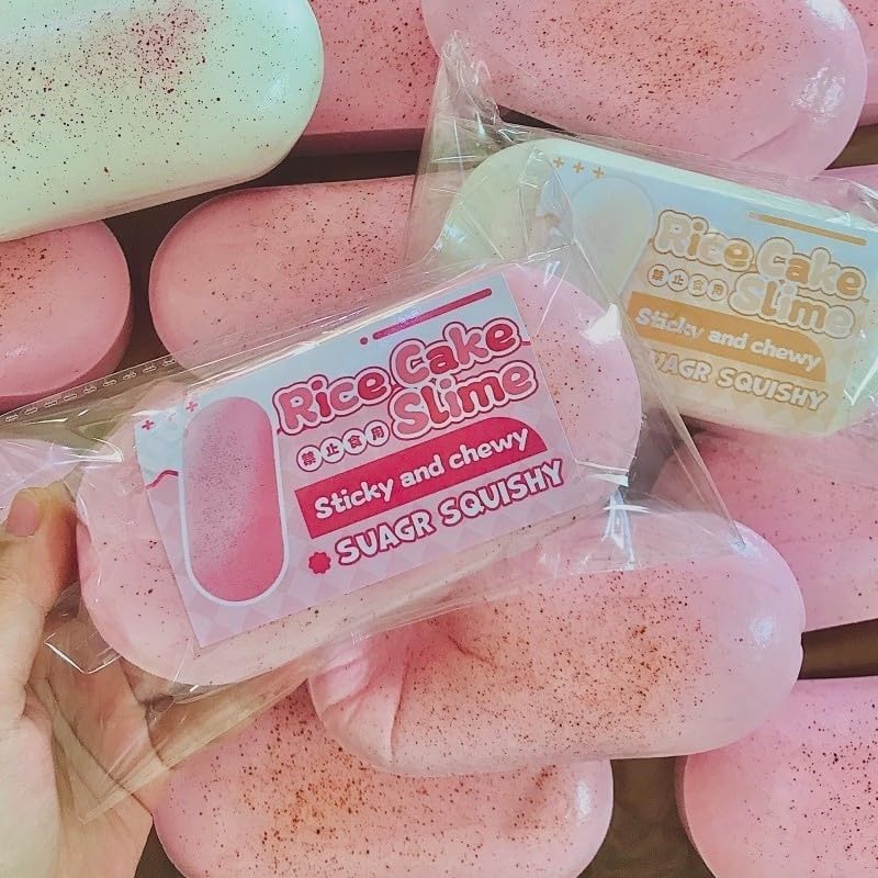 Two tone pink and white cheese stick squishy fidget toy