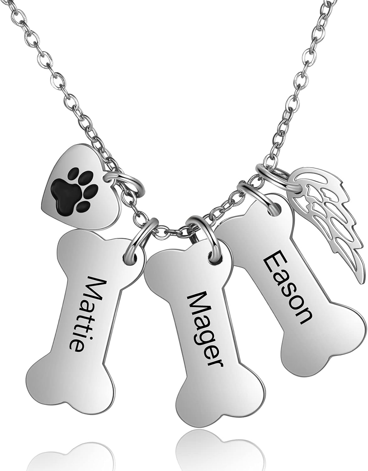 Detailed scale view of the engraved dog bone and paw print charms for size accuracy.