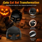 Side view of cat wearing adjustable black bat helmet costume