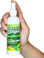 Authentic Kitty Ka-Zoom cat training spray displaying product size and North American sourcing information.