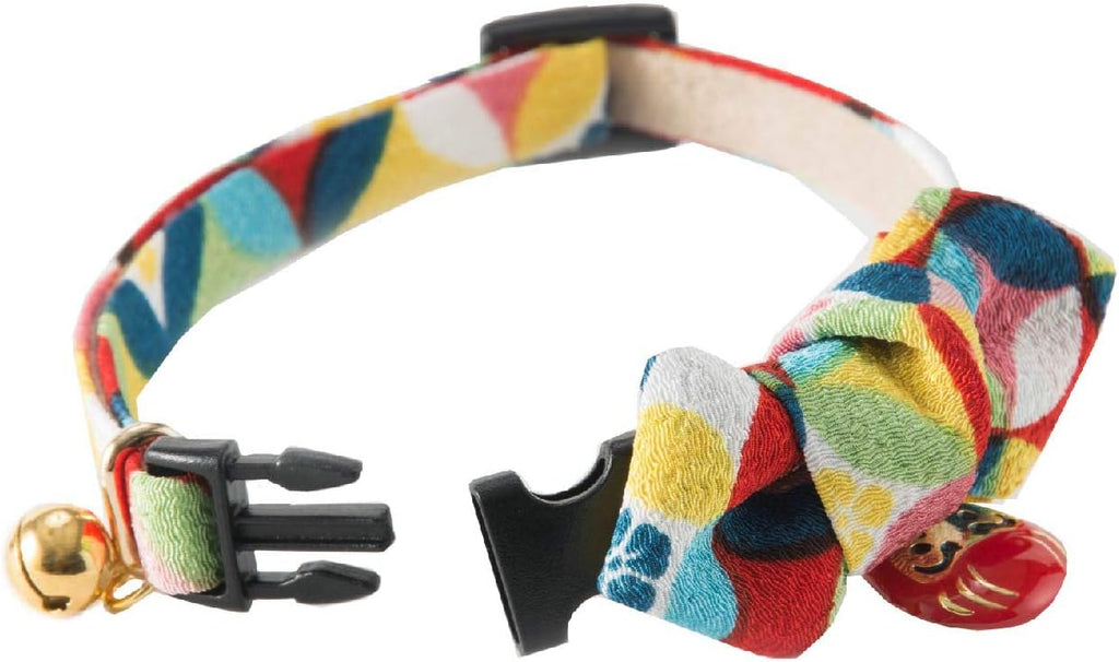 Stylized angle highlighting the bow tie and charm features of the Necoichi pet accessory.