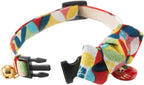 Stylized angle highlighting the bow tie and charm features of the Necoichi pet accessory.