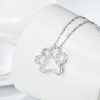 ONEFINITY 925 sterling silver paw necklace displayed inside its exquisite gift box