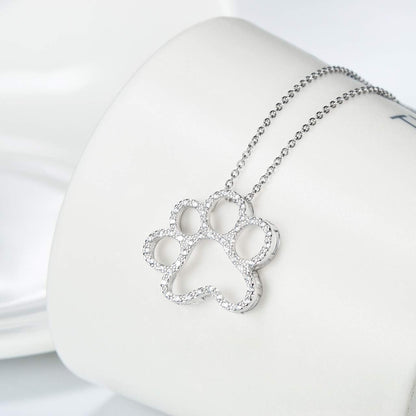 ONEFINITY 925 sterling silver paw necklace displayed inside its exquisite gift box