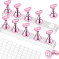 Tkyzms magnetic nail stand set front view showing pink acrylic bases and chess piece holders